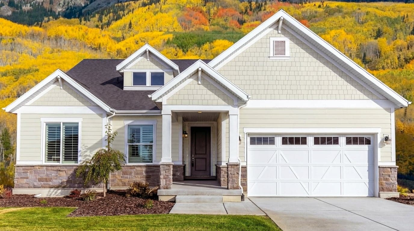 House with siding painted in Cloud White 967 by Benjamin Moore
