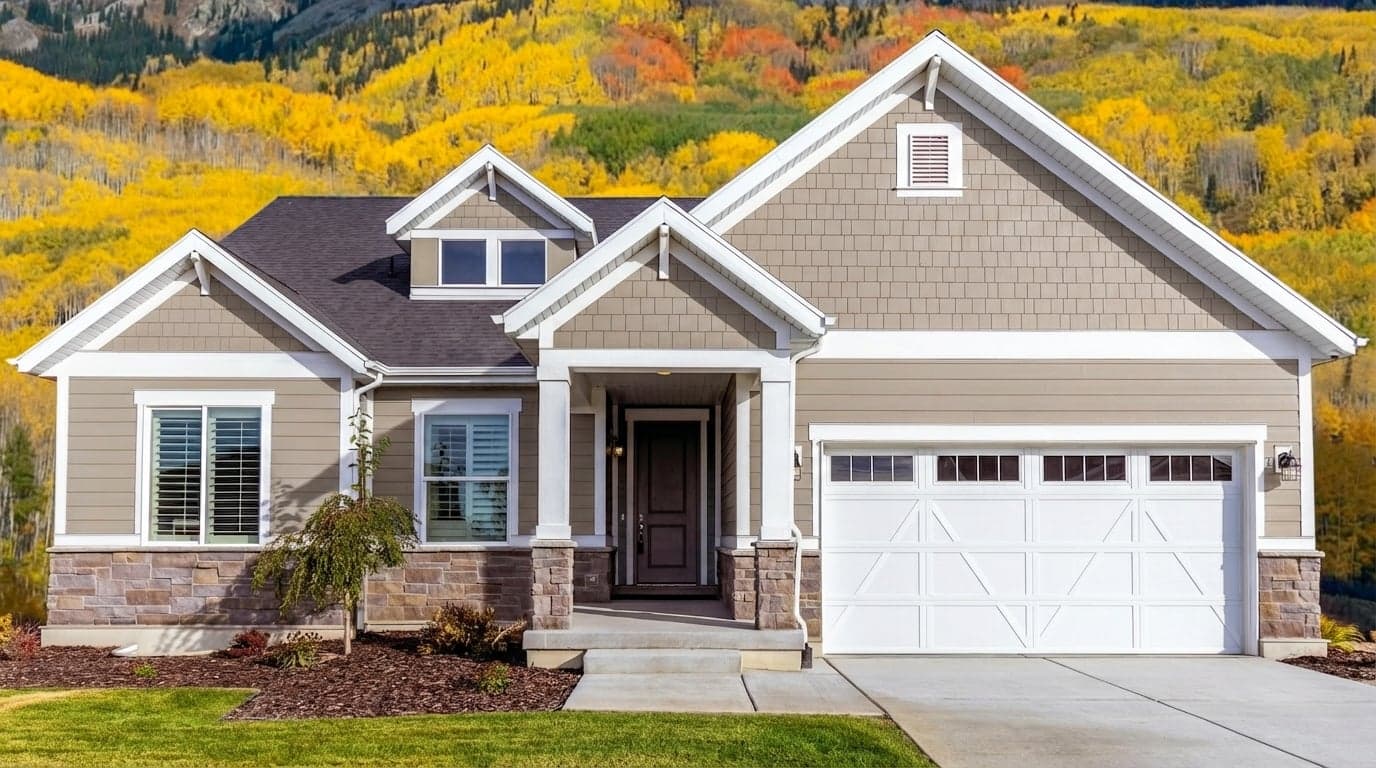 House with siding painted in Balanced Beige SW-7037 by Sherwin-Williams