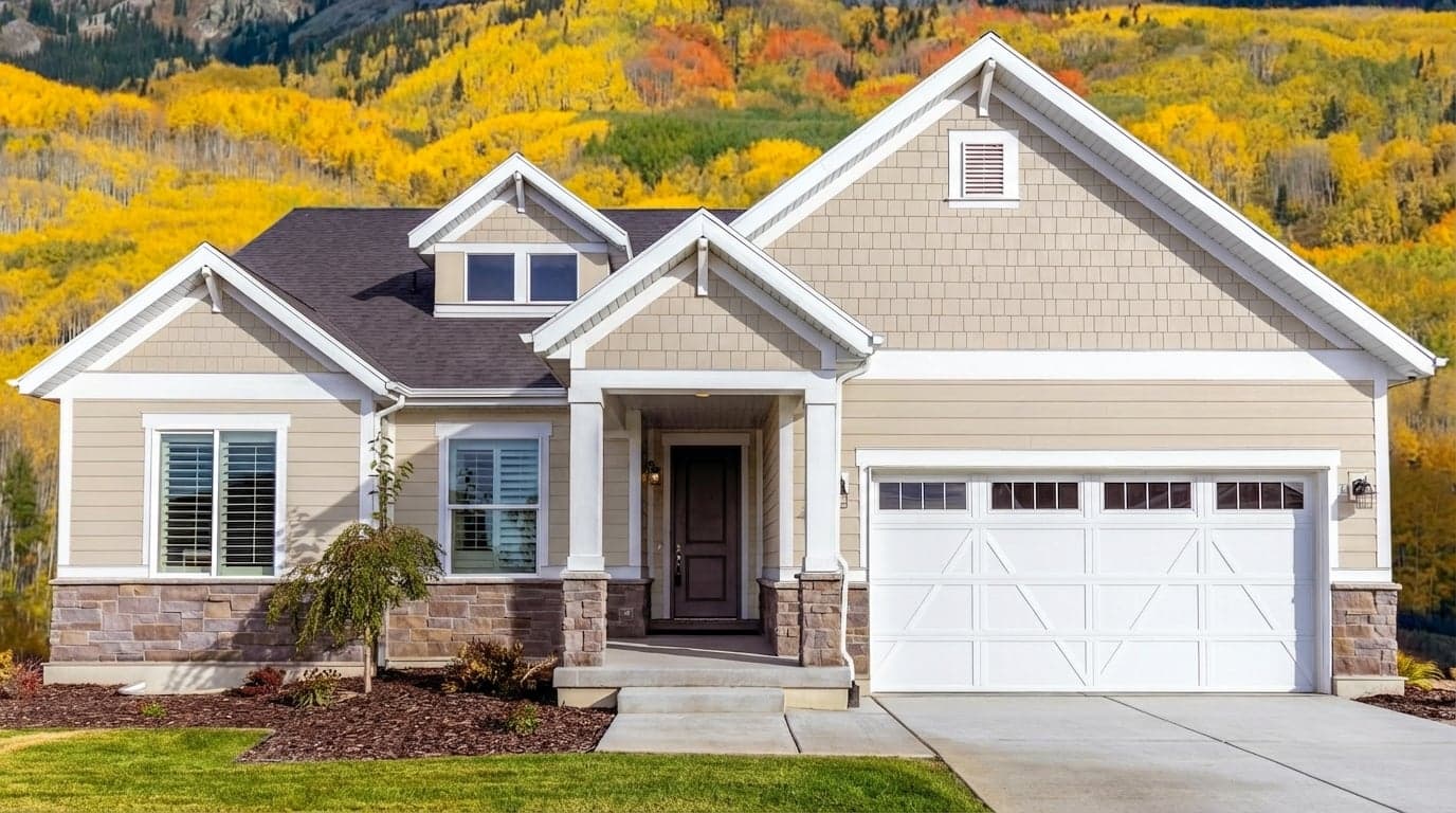 House with siding painted in Cream In My Coffee 3003-10C by Valspar