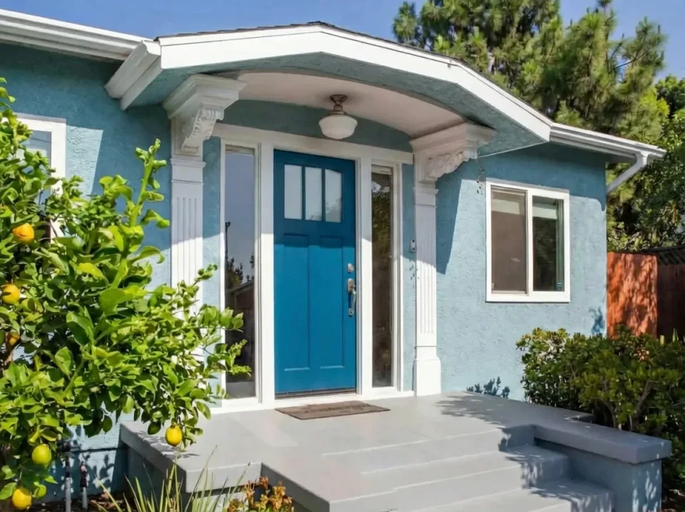 Entry door painted with Dignity Blue (SW 6804)